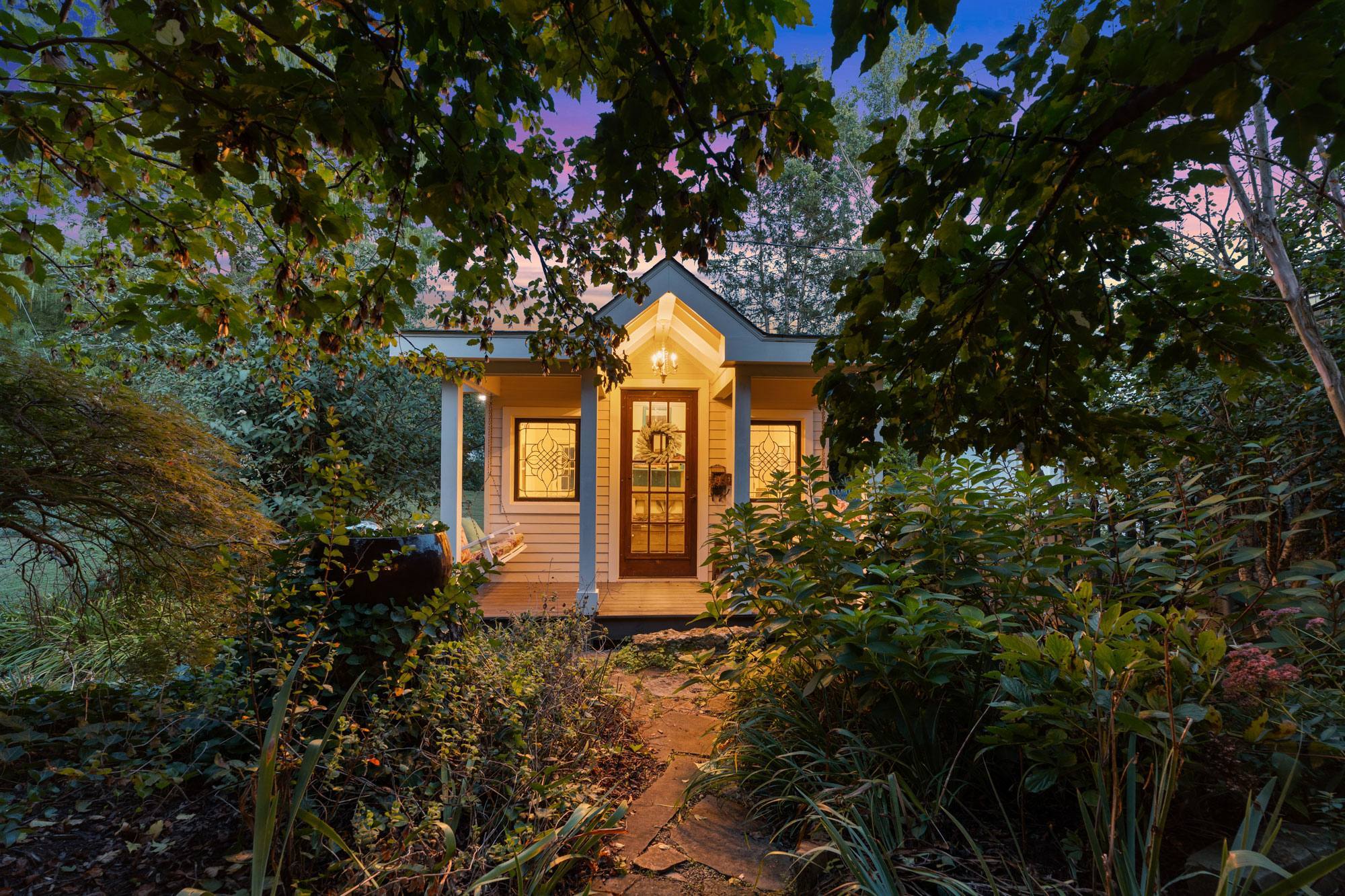 Cottage entrance at dusk, Brentwood, TN property